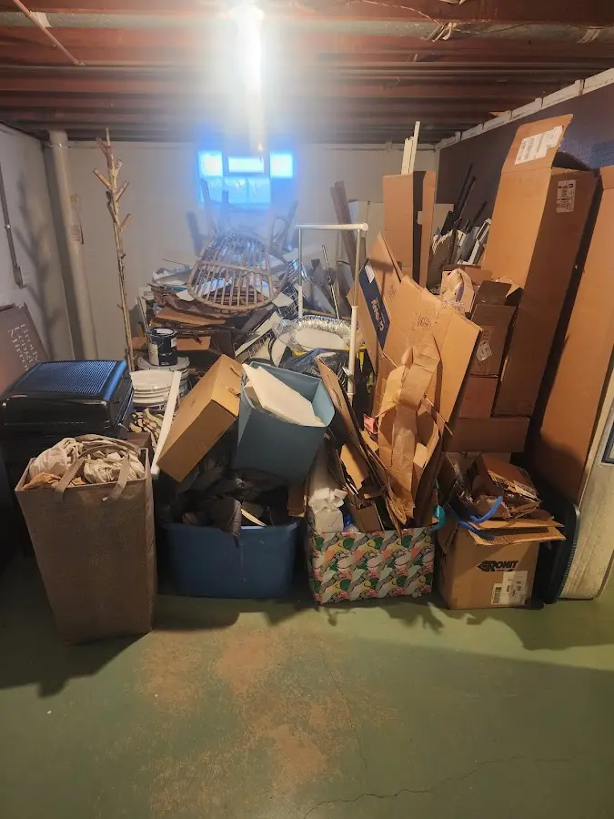 Roll-off dumpster container at job site for Construction Dumpster Rental in Woburn